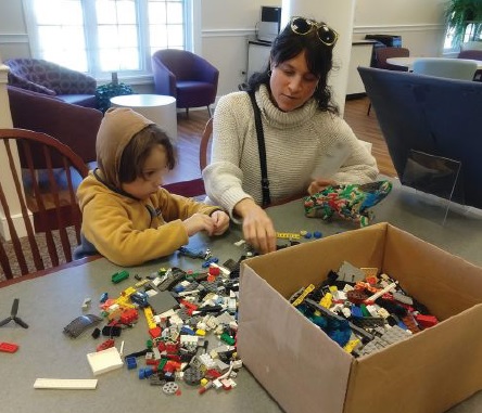 Families in Monroe, Connecticut, enjoy new library space because one couple and one club – the Monroe Lions – chose to pay it forward.