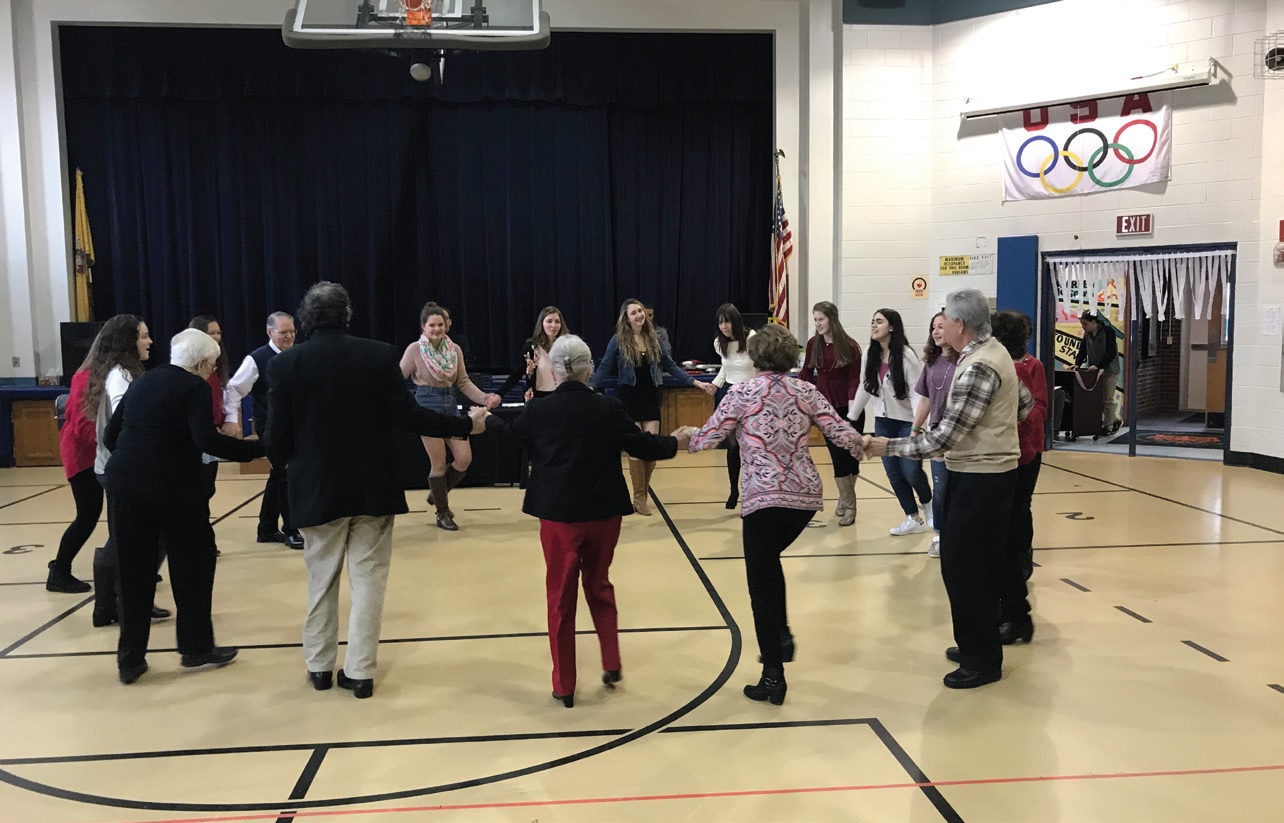 Fifty seniors taught the teens how to salsa, do the cupid shuffle and electric slide at their prom sponsored by the Haddonfield Memorial High School Leo Club in New Jersey.