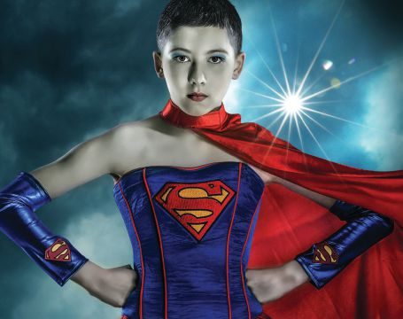 A girl in a super hero costume