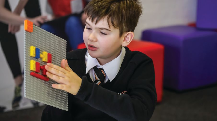 With printed letters, numbers, and symbols, the new LEGO Braille Bricks can be enjoyed by all. PHOTO COURTESY OF THE LEGO GROUP
