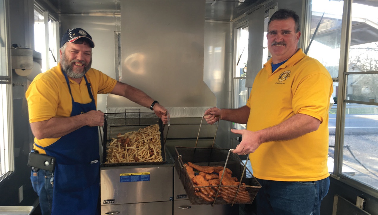 Lions Donald Jessie and Scott Vincent are the men behind their club's custom 26-foot cooking trailer.