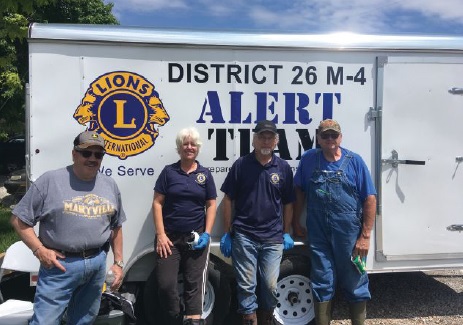 Maryville Pride Lions Ed and Jeanine Montgomery and Jerry Watkins, and Lion Duane Nauman of the Mound City Lions Club, worked more than 50 hours helping with flood cleanup in Missouri.