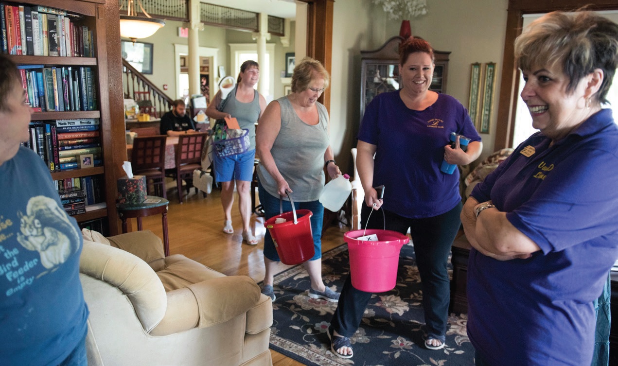 Lioness clubs have long been workhorses of the Lion family. Here the Van Dyne and Fond Du Lac Lionesses help maintain a home for transplant patients and their families.