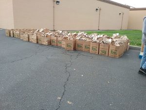 A line of up boxes filled with fire relief packages
