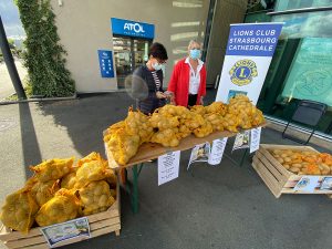 Lions Club members sell potatoes