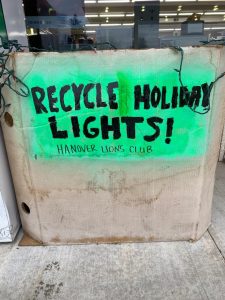 Lions recycling Christmas Lights