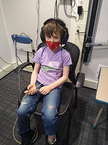 child having hearing tested WEB