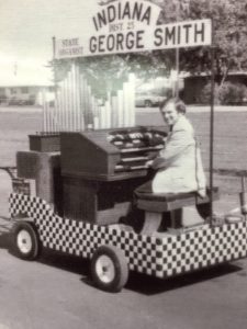Man playing organ in parade