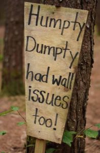 Sign says Don't worry humpty dumpty had wall issues too