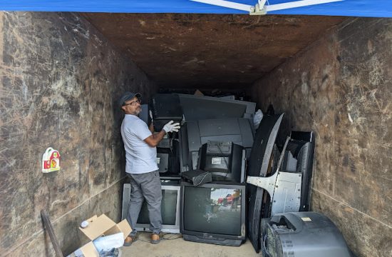 Lion loads e-waste into truck