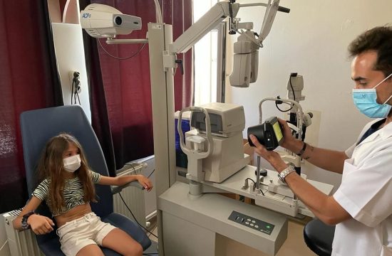 Girl waits for vision treatment