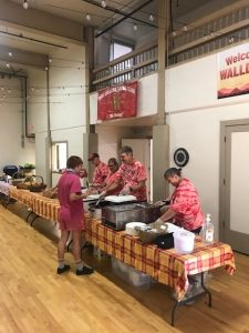The Dalles Lions serve food