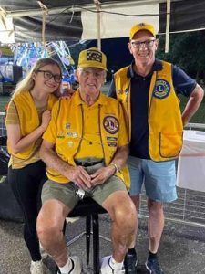 Three Lions post with vests on 