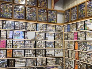 Thousands of Lions Club pins cover walls