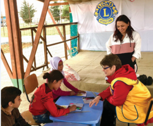 With Syrian Children in Refugee camp centres